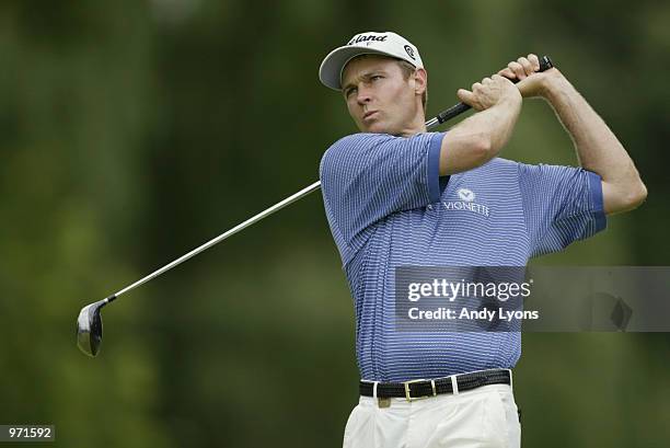 Bob Estes hits off the fifth tee during the third round of the Advil Western Open July 6, 2002 at Cog Hill Golf and Country Club in Lemont, Illinois.