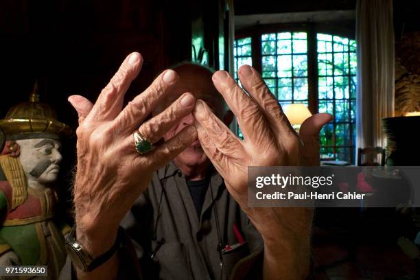 The hands of legendary 94 year-old American photojournalist David Douglas Duncan , better known as DDD, at a restaurant with friends in La Garde...