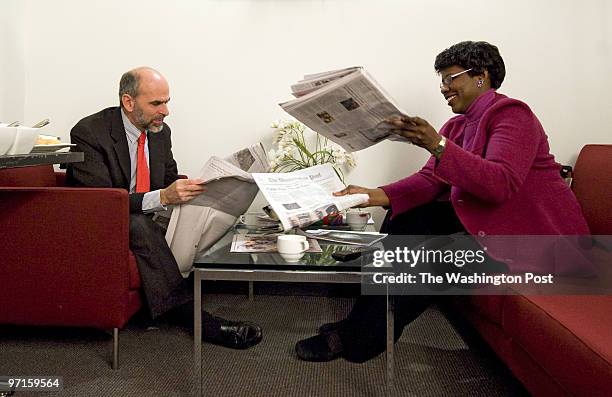 Stephanopoulos Date: Kevin Clark/The Washington Post Neg #: clarkk205320 Washington, DC Gerald Seib, left, and Gwen Ifill go over the news before the...