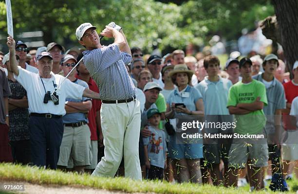 Davis Love III hits out of the rough on the 16th fairway during the second round of the Advil Western Open on July 5, 2002 at Cog Hill Golf and...