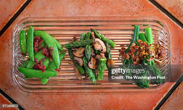 Cinnamon Creek Drive, Vienna, VA Photos of food to accompany story on alternative green side dishes for Thanksgiving. From left, Sugar Snap Peas with...