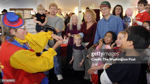 Pw-event assignment NVCC campus parking lot Quantico-Balvoir Business Alliance gathering Photographer: Gerald Martineau Carol Collins as "Bingo the...