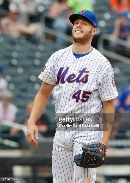 Pitcher Zack Wheeler of the New York Mets reacts in an interleague MLB baseball game against the Baltimore Orioles on June 6, 2018 at CitiField in...