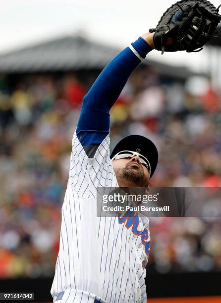 Adrian Gonzalez of the New York Mets catches an infield fly ball in an interleague MLB baseball game against the Baltimore Orioles on June 6, 2018 at...