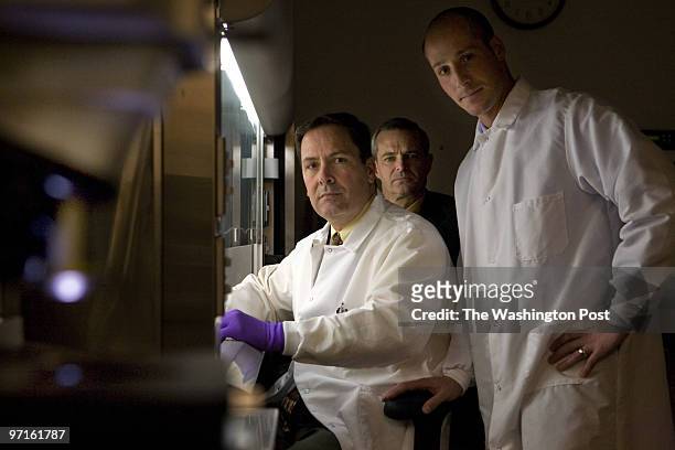 From left, forensic examiner Jason Bannan Ph.D., supervisory special agent Scott Decker, and supervisory special agent Matthew Feinberg, pose for a...
