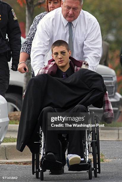 Funeral for Ryan Didone, the 15-year-old who was killed in a car accident Monday night. Pictured, crash survivor Christopher Nicholson is wheeled out...