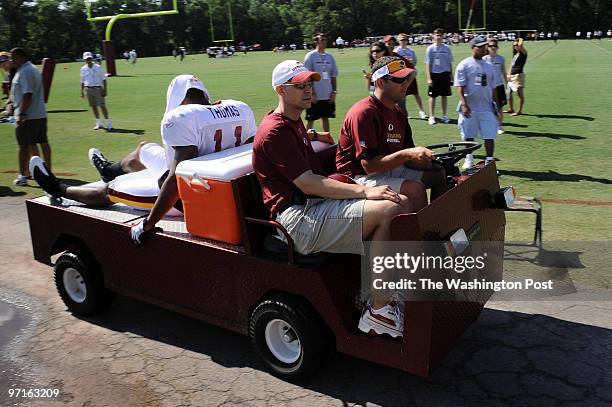 Ashburn, VA. Skins training camp. Here, Redskins' rookie WR Devin Thomas is carted off the field after injuring his hamstring during 11-on-11 drills.