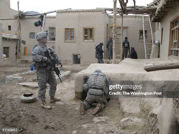 Downloaded 3/1/2009, WLG. CREDIT: Pam Constable / TWP Logar province, Afghanistan. US soldiers search villages and farms in the area of Baraki Barak...