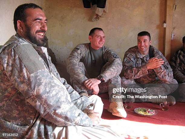 Downloaded 3/1/2009, WLG. CREDIT: Pam Constable / TWP Logar province, Afghanistan. Capt. Ali Agha, left, an Afghan Security guard officer, with US...