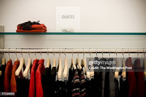 Clothes by European designers such as Gucci are sold at Carol Mitchell's store at Tyson's Galleria mall on October 16, 2008. Mitchell said business...