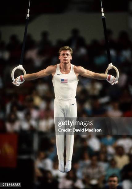 Mike Chaplin of the United States competes on the still rings during a USA - USSR gymnastics meet on April 24, 1988 at the Arizona Veterans Memorial...