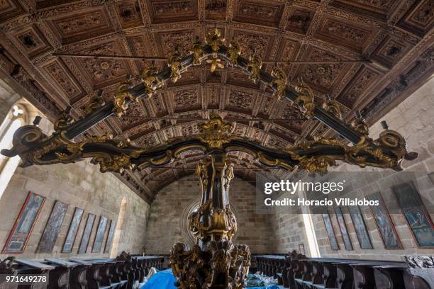 View candelabra and decorated ceiling of the nuns' section in Santa Clara Church, part of the Convent of Santa Clara, on May 28, 2018 in Vila do...