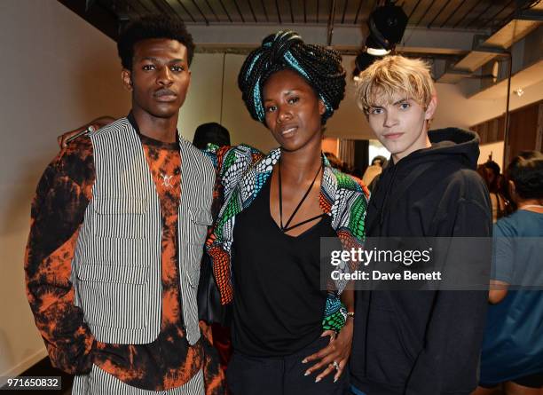 Aicha McKenzie attends the What We Wear show during London Fashion Week Men's June 2018 at the BFC Show Space on June 11, 2018 in London, England.