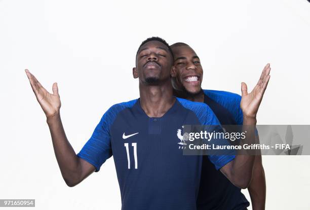 Ousmane Dembele of France poses for a portrait with Djibril Sidibe during the official FIFA World Cup 2018 portrait session at on June 11, 2018 in...