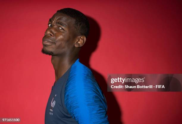 Paul Pogba of France poses for a potrait at the team hotel during the official FIFA World Cup 2018 portrait session at on June 11, 2018 in Moscow,...