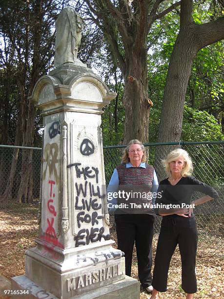 Downloaded E-mail 9/24/2008, WLG. CREDIT: John Kelly / TWP , . Mary Lipsey and Lynne Garvey-Hodge in the Marshall family cemetery in Burke. The two...