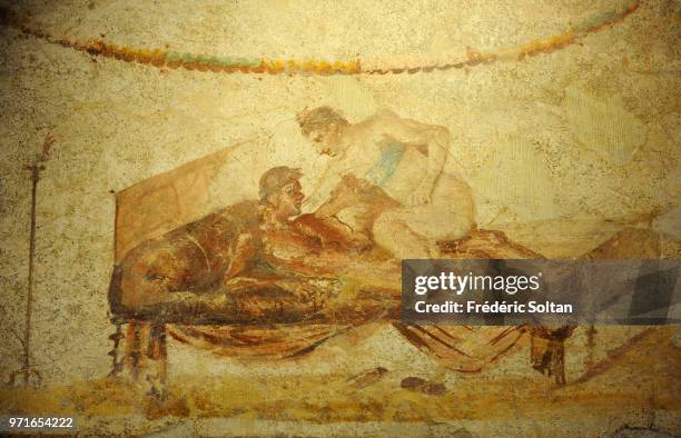 Roman City of Pompeii. Erotic fresco from the Lupanar, , Campania, Italy. Roman civilisation, 1st century AD. In Naples on January 10 Italy.