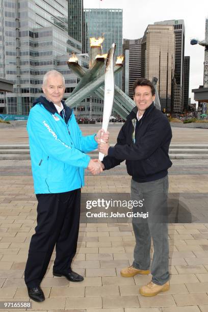 On the eve of the closing ceremony of the Vancouver 2010 Winter Olympic Games, VANOC Cheif Executive John Furlong passes the torch to Sebastian Coe...