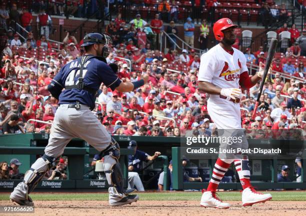 Milwaukee Brewers catcher Jett Bandy reacts as St. Louis Cardinals' Dexter Fowler strikes out to end a game between the St. Louis Cardinals and the...