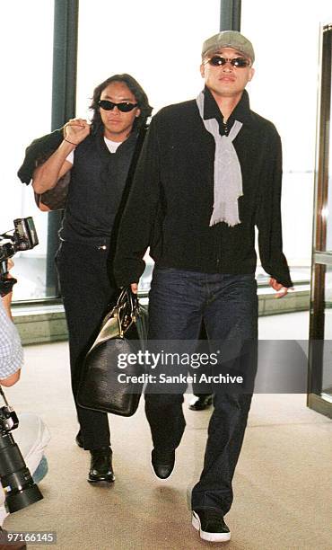 Kazuyoshi Miura and Tsuyoshi Kitazawa are seen upon arrival after being dropped from 1998 France World Cup squad at New Tokyo International Airport...