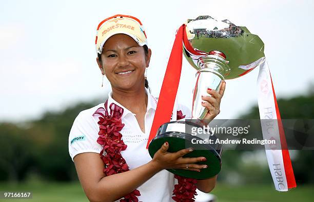 Ai Miyazato of Japan poses with the trophy after winning the HSBC Women's Champions at the Tanah Merah Country Club on February 28, 2010 in Singapore.