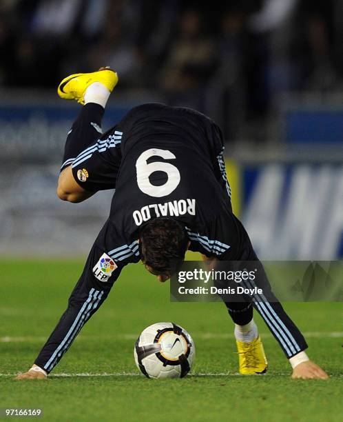 Cristiano Ronaldo of Real Madrid loses his balance during the La Liga match between Tenerife and Real Madrid at the Heliodoro Rodriguez Lopez stadium...