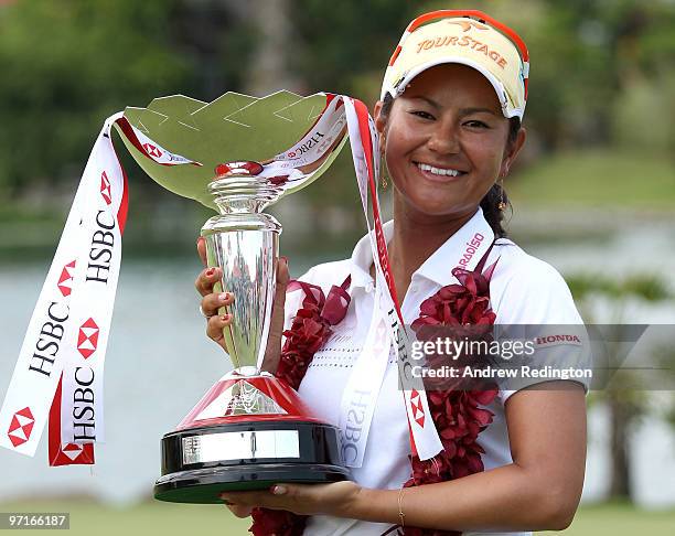 Ai Miyazato of Japan poses with the trophy after winning the HSBC Women's Champions at the Tanah Merah Country Club on February 28, 2010 in Singapore.