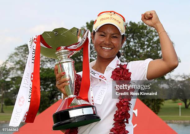Ai Miyazato of Japan with the winners trophy after the final round of the HSBC Women's Champions at the Tanah Merah Country Club on February 28, 2010...