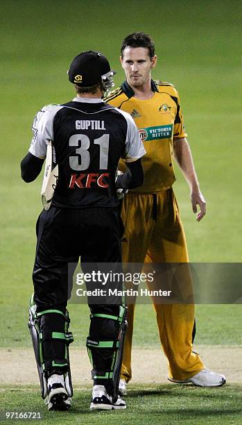 Shaun Tait of Australia congratulates Martin Guptill of New Zealand during the Twenty 20 International match between the New Zealand Black Caps and...