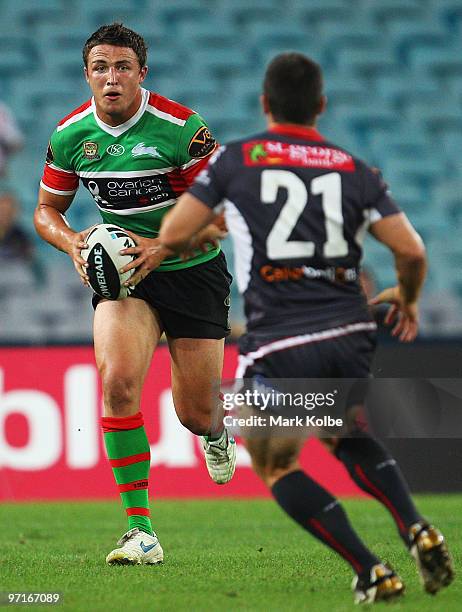 Sam Burgess of the Rabbitohs runs the ball during the NRL Charity Shield match between the South Sydney Rabbitohs and the St George Illawarra Dragons...