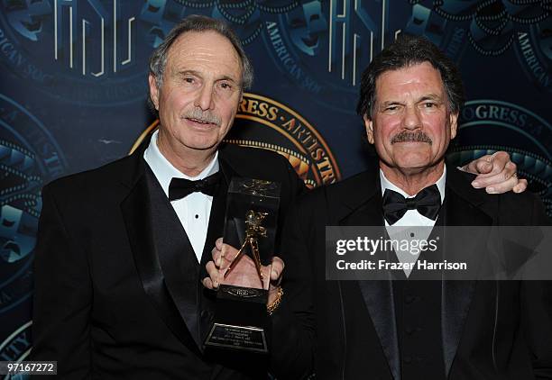 Cinematographer Michael O'Shea presents John C.Flinn, ASC the Career Achievement in Television Award pose in the press room at the 24th Annual...