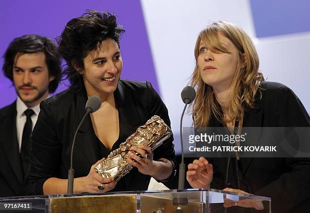 French Claire Burger and Marie Amachoukeli give a speech after receiving the award of the best short film for "C'est gratuit pour les filles" during...