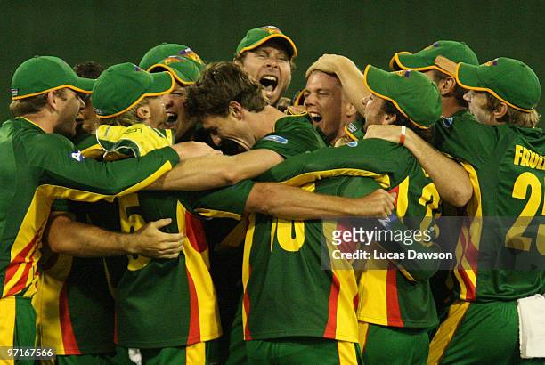 Tasmania players celebrate after winning the Ford Ranger Cup Final match between the Victorian Bushrangers and the Tasmanian Tigers at the Melbourne...