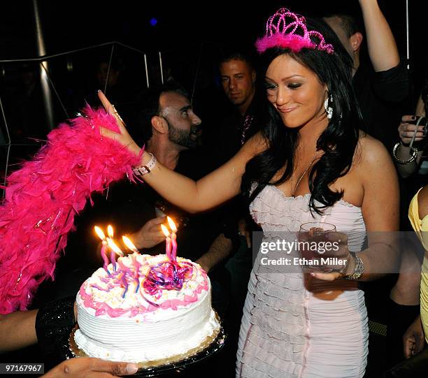 Television personality Jenni "JWoWW" Farley from the MTV show, "Jersey Shore" is presented with a cake as she celebrates her 25th birthday at Moon...