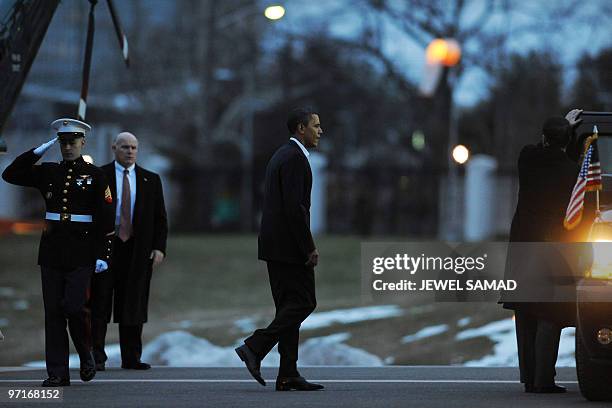 President Barack Obama disembarks the Marine One helicopter as he arrives at the National Naval Medical Center in Bethesda, Maryland, on February 28,...