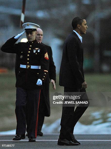 President Barack Obama disembarks the Marine One helicopter as he arrives at the National Naval Medical Center in Bethesda, Maryland, on February 28,...