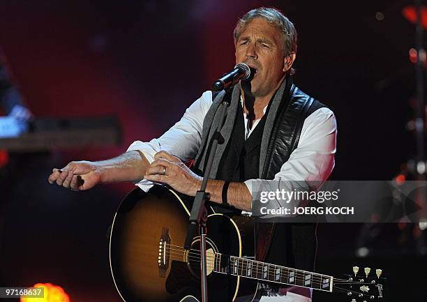 Actor and singer Kevin Costner performs on stage with his band "Kevin Costner & Modern West" during the 187th edition of the TV show "Wetten,...