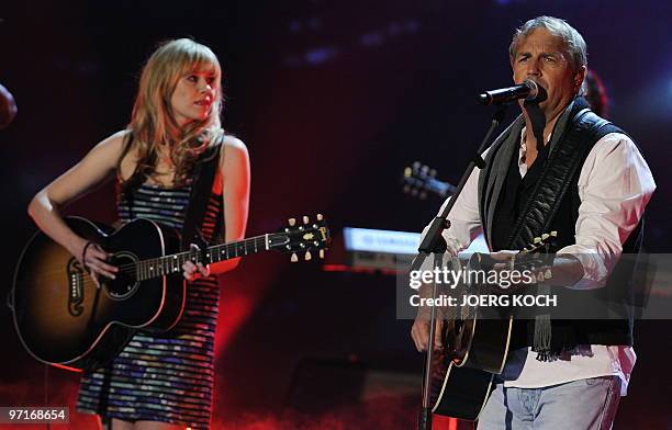 Actor and singer Kevin Costner performs on stage with his band "Kevin Costner & Modern West" during the 187th edition of the TV show "Wetten,...