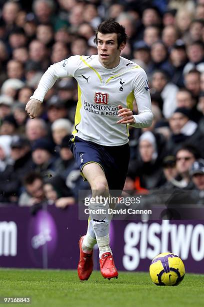 Gareth Bale of Tottenham runs with the ball during the Barclays Premier League match between Tottenham Hotspur and Everton at White Hart Lane on...