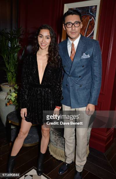 Adrianne Ho and Hu Bing attend the GQ Dinner co-hosted by Dylan Jones and Loyle Carner to celebrate London Fashion Week Men's June 2018 at Neptune At...