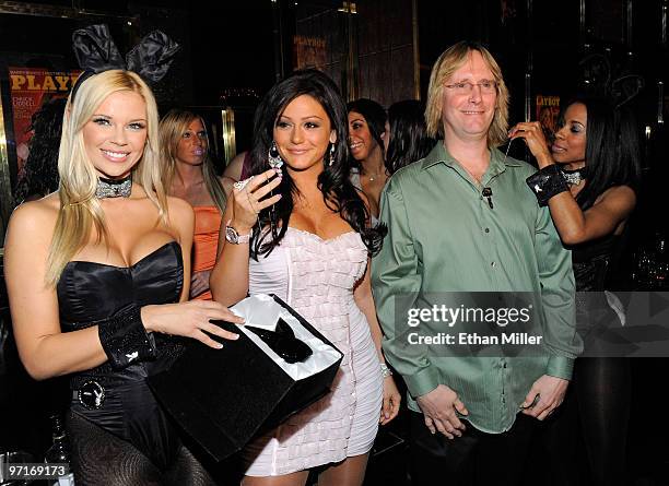 Playboy bunny cocktail servers Jessa Hinton and Chandella Powell present television personality Jenni "JWoWW" Farley from the MTV show, "Jersey...