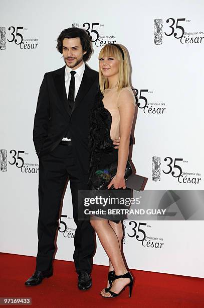 Canadian actor Marc-Andre Grondin and guest arrive the 35th Cesar's French film awards ceremony on February 27, 2010 at the Theatre du Chatelet in...