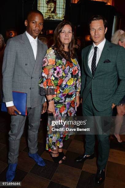 Eric Underwood, Caroline Gautier and Paul Sculfor attend the GQ Dinner co-hosted by Dylan Jones and Loyle Carner to celebrate London Fashion Week...