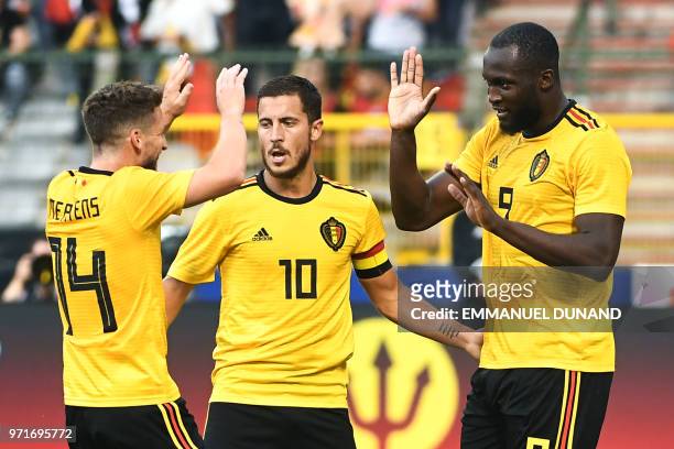 Belgium's forward Romelu Lukaku celebrates with a teammates Belgium's forward Dries Mertens and Belgium's forward Eden Hazard after scoring a goal...