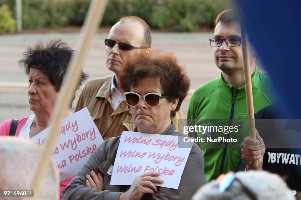 People holding flag of Poland and European Union and banners that speak - 'Free Courts, Free elections, Free Poland' are seen in Gdansk, Poland on 11...