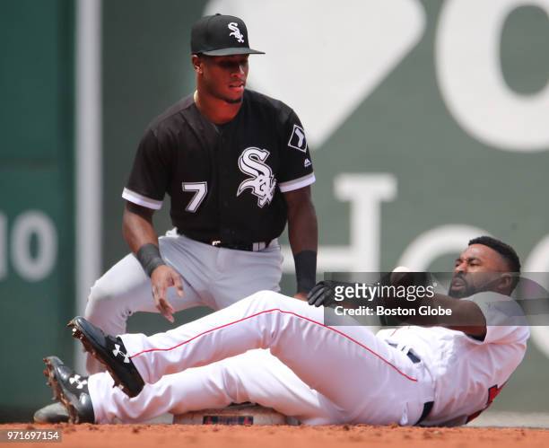 Boston Red Sox player Jackie Bradley Jr. Is safe stealing second base as Chicago White Sox player Tim Anderson cannot hold onto the ball during the...