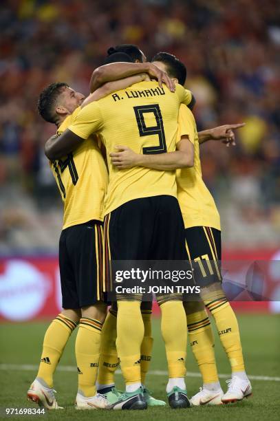 Belgium's forward Romelu Lukaku celebrates with teammates after scoring a goal during the international friendly football match between Belgium and...