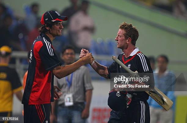 England batsman Paul Collingwood is congratulated by captain Alastair Cook after England won the 1st ODI between Bangladesh and England at...