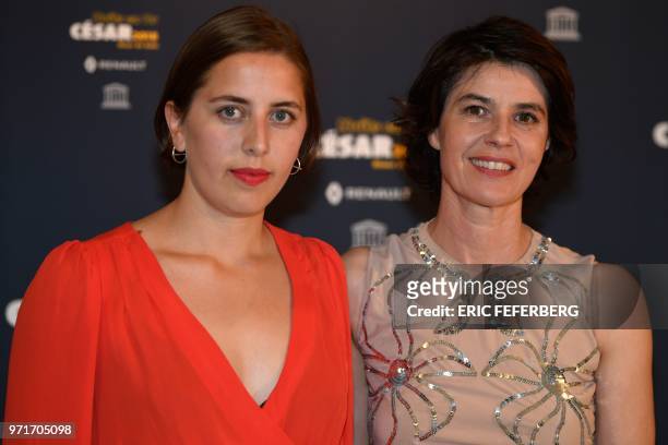 French-Swiss actress Irene Jacob and Norway's film director Liv Joelle Barbosa Blad pose during a photocall for the 8th Diner Gala 'Les Nuits en Or...