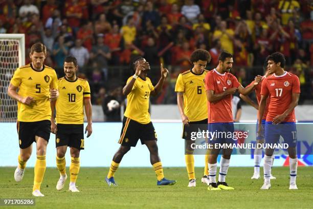 Belgium's forward Michy Batshuayi celebrates with teammates after scoring a goal during the international friendly football match between Belgium and...